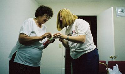 mom and my sister Michelle taking care of some necessary detail